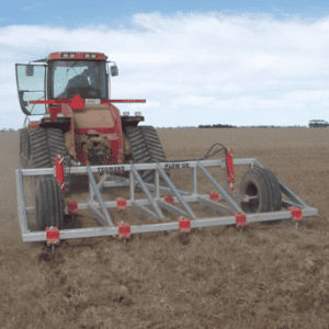 Yeomans plow working soil, depth control wheels