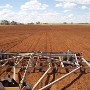 Yeomans trailing Plow with fixed shanks and hydraulic depth control