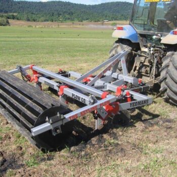 GP398 Yeomans GP39 working in green field, green ripping for keyline water control, sub soil aeration, fitted with crumble roller, 5 22in shanks 5 16 coulters xarm roller