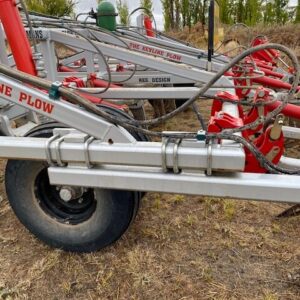Yeomans keyline plow fitted with hydraulic crumble roller as well as hydraulic stump jump cylinder shanks