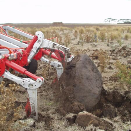 Yeomans hydraulic stump jump plow lifting rock form ground